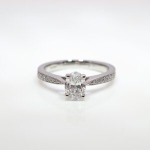 Platinum Oval Lab Grown Solitaire with Natural Diamond Shoulders Ring