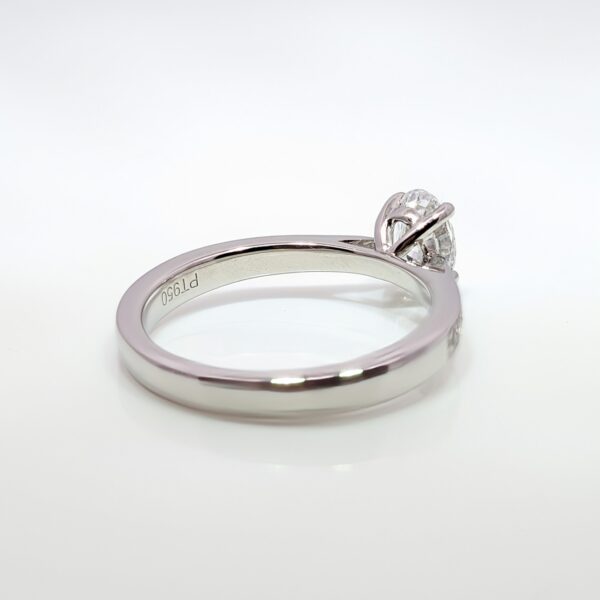 Platinum Oval Lab Grown Solitaire with Natural Diamond Shoulders Ring