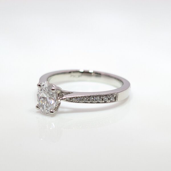 Platinum Oval Lab Grown Solitaire with Natural Diamond Shoulders Ring