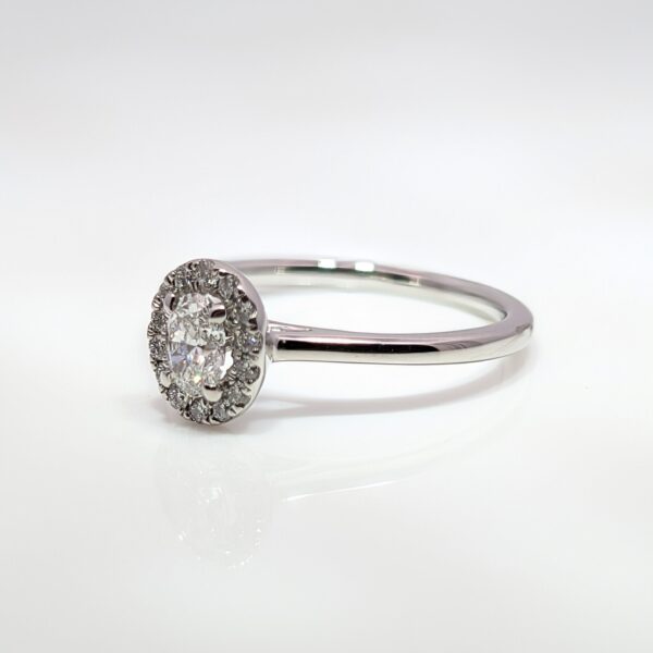 Platinum 0.30ct Oval Halo Diamond Engagement Ring