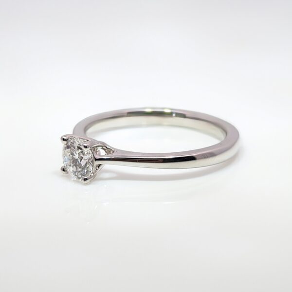 This Round Brilliant Cut Lab Grown Diamond is 0.50cts with D Colour and VS1 Clarity. A classic engagement ring.