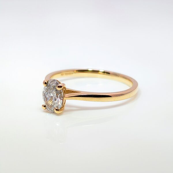 This popular Oval Lab Grown Diamond Ring has a 0.50ct stone set in a 9ct yellow band. Perfect pick for an Engagement Ring.