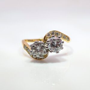 Two Stone Brilliant Cut 1.27ct Diamonds in an 18ct Yellow Gold Band